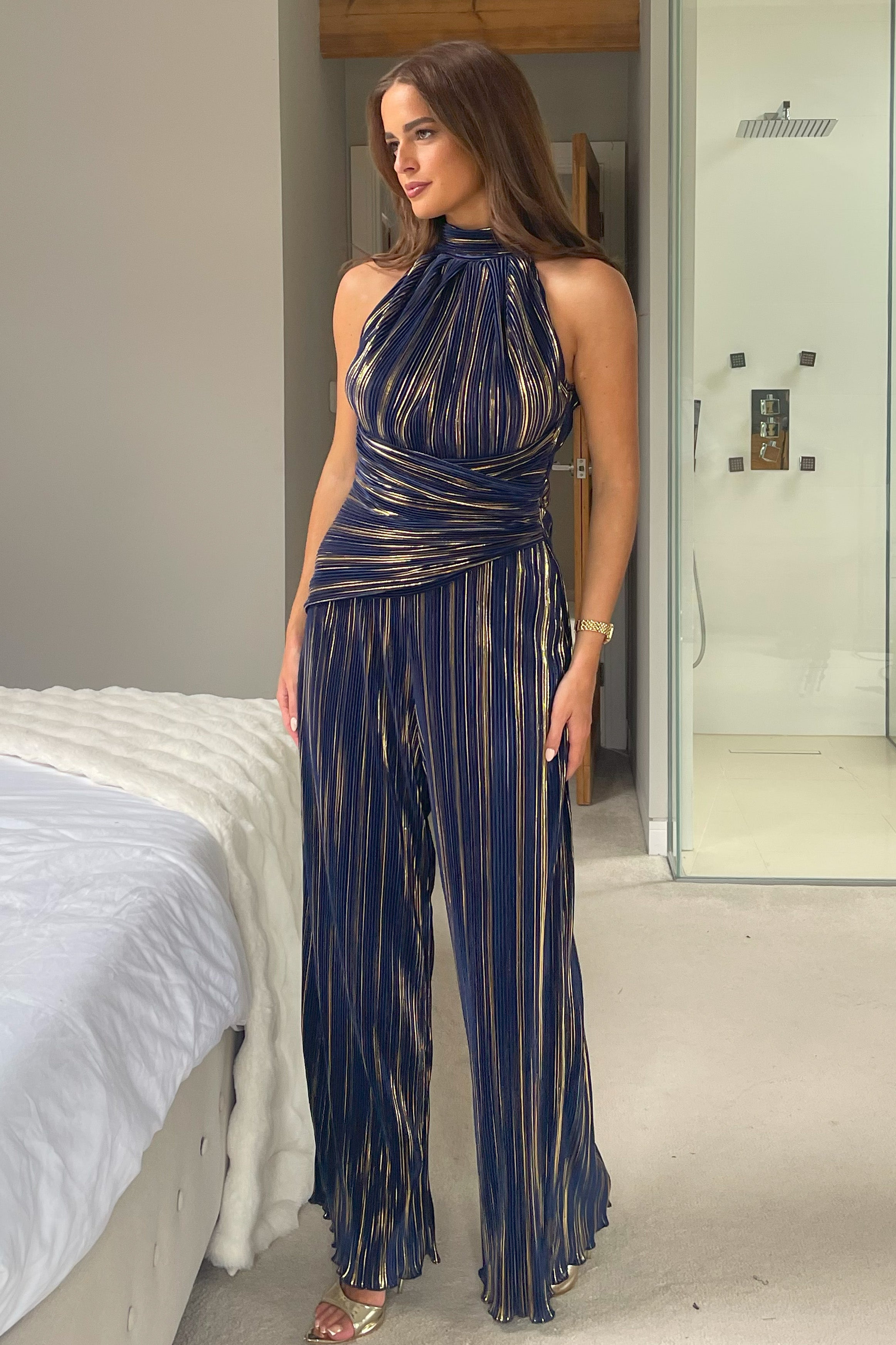 Gwen Halter Neck Plisse Jumpsuit in Navy and Gold