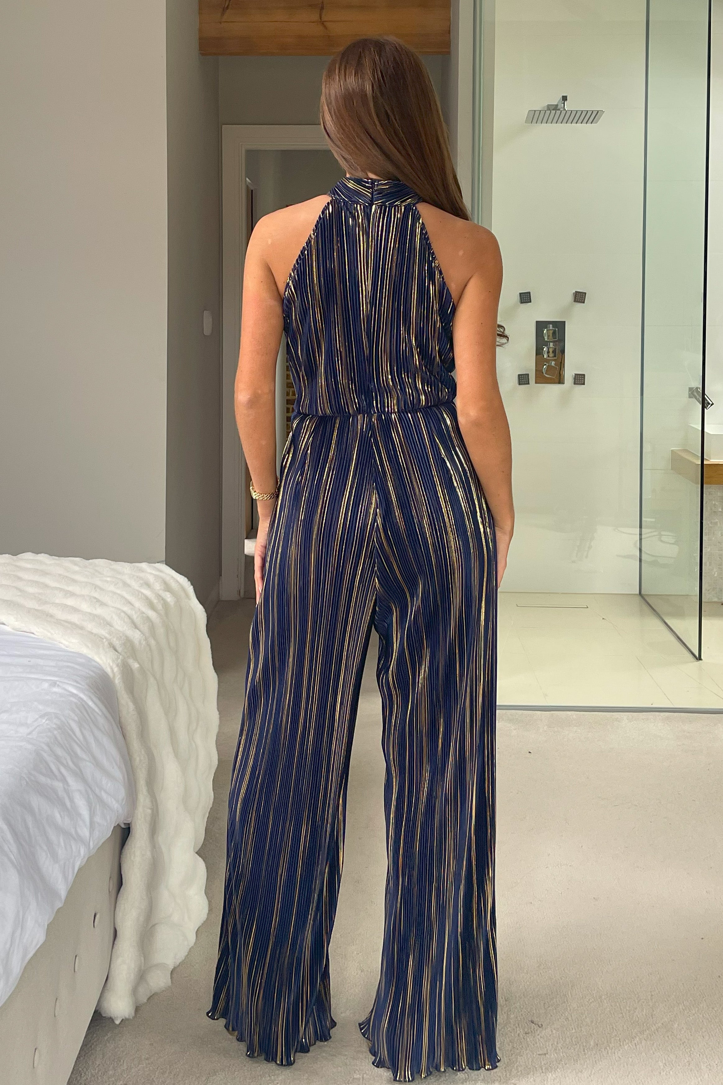Gwen Halter Neck Plisse Jumpsuit in Navy and Gold